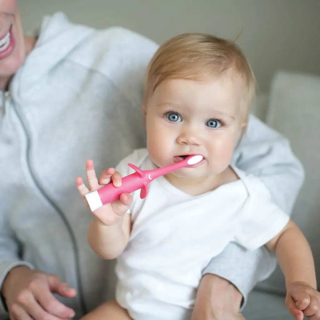 Lifestyle_Infant-to-Toddler_Toothbrush_Elephant_revised-Pink_1.webp