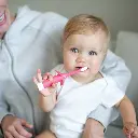 Lifestyle_Infant-to-Toddler_Toothbrush_Elephant_revised-Pink_1.webp